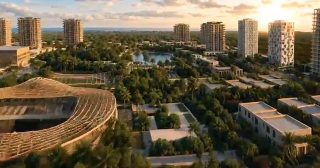 Render de un polo de desarrollo urbano con torres residenciales, espacios verdes, lagos artificiales y arquitectura moderna al atardecer.